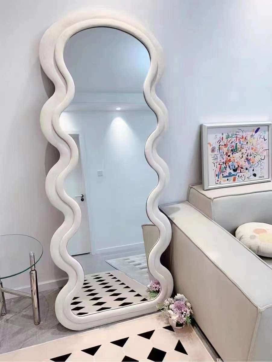 Elevate your space with the bold, contemporary flair of the Zigzag Mirror. Its unique, angular design creates an eye-catching reflection that adds depth and style to any room. Perfect for modern interiors, this mirror blends functionality with artistic expression, making it a statement piece that enhances both small and large spaces.