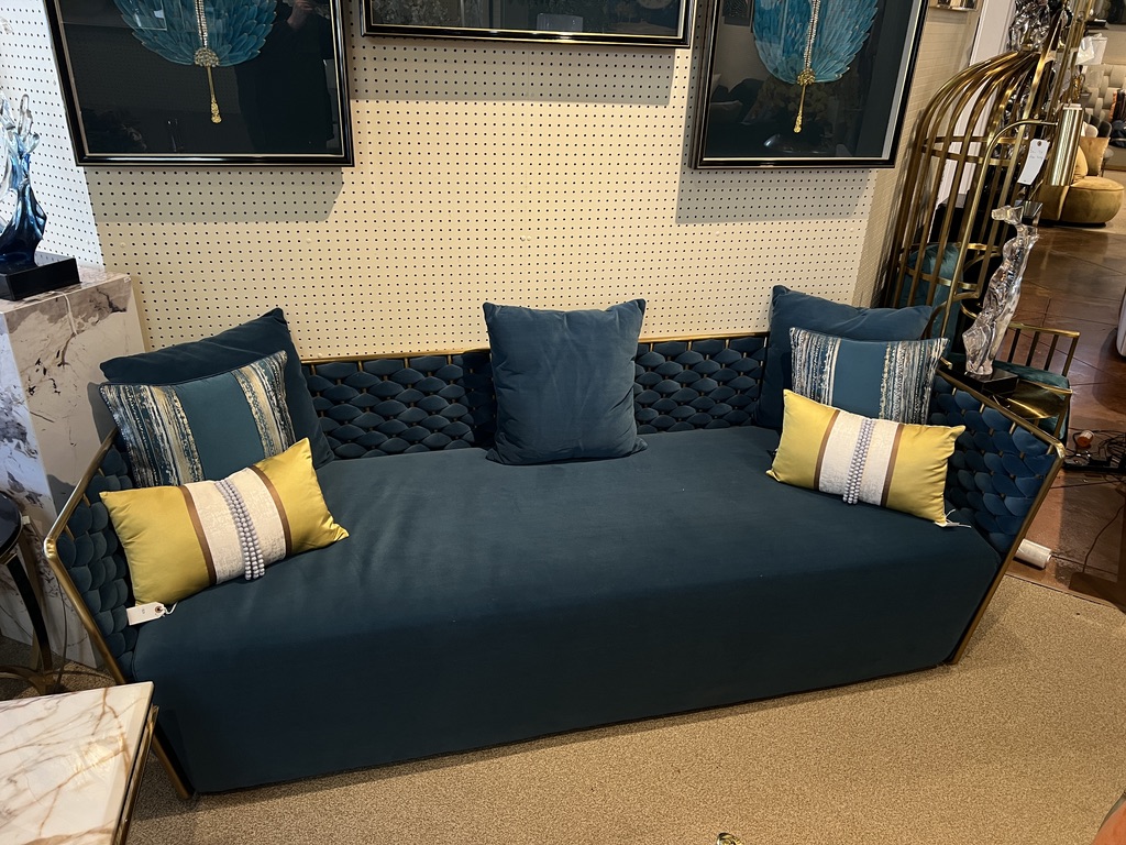 Deep Teal Woven-Back Sofa — showroom photograph