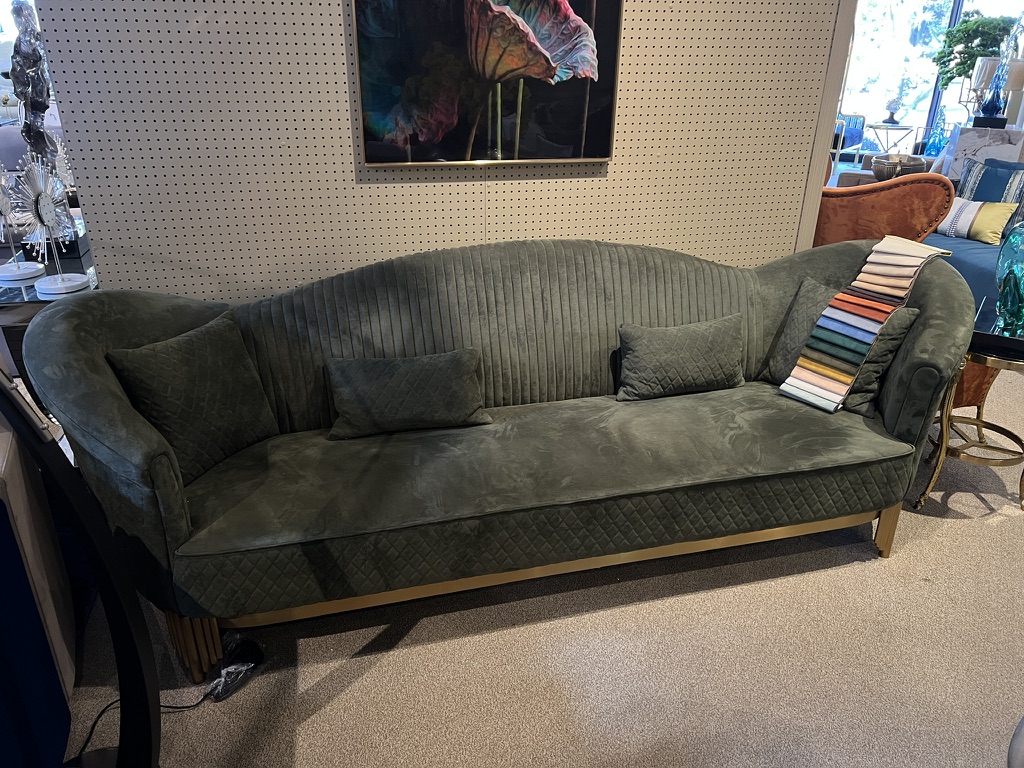 Olive Green Channel-Back Sofa — showroom photograph