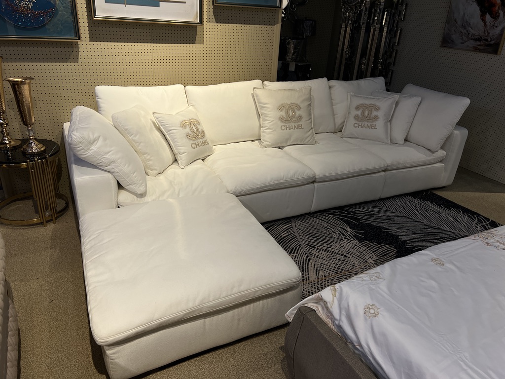White Chaise Sectional — showroom photograph