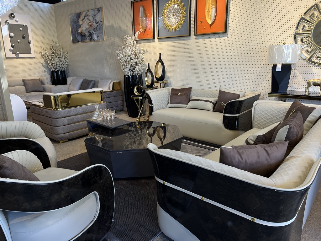 Ivory Sofa with Black Wraparound Panels — showroom photograph